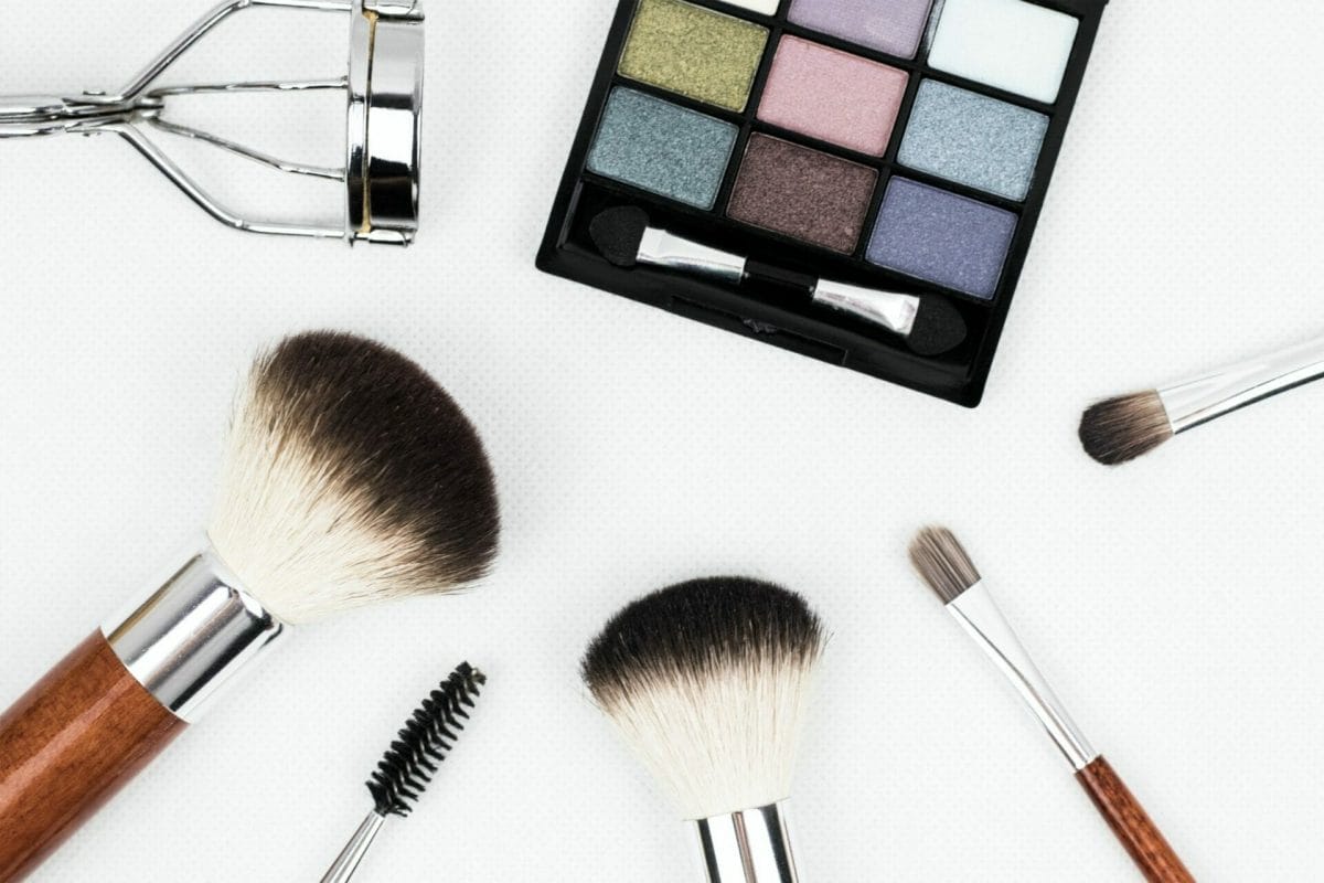Makeup brushes and palette on a table