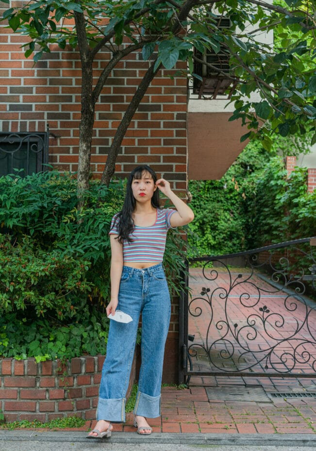 Korean Woman with Crop Top and baggy jeans