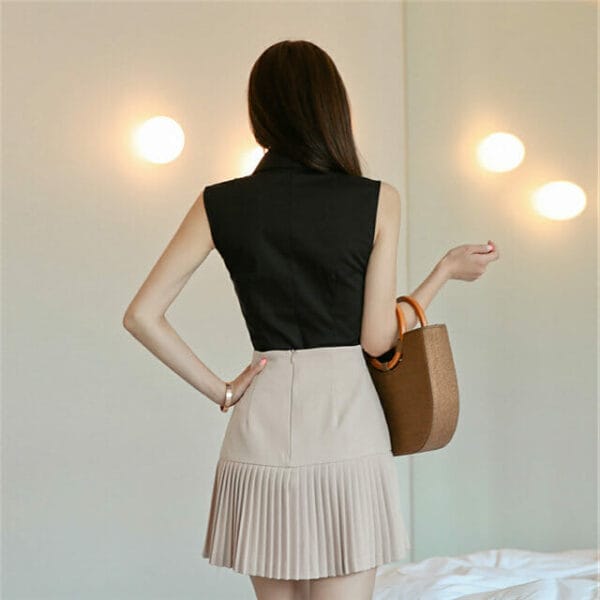 Modern Lady Doll Collar Blouse with Double-breasted Pleated Skirt 5